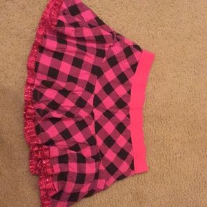 Pink and black checkered skirt